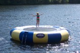 our water trampoline at our main docks near our quality inn, pet friendly resort ontario, otter lake resort. parry sound hotel includes cottages cottages and pet friendly accommodations
